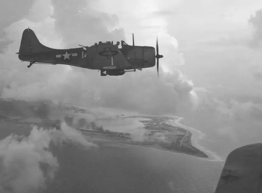  Douglas SBD-5 Dauntless Dive Bomber of VMSB-333 over Wake Island.